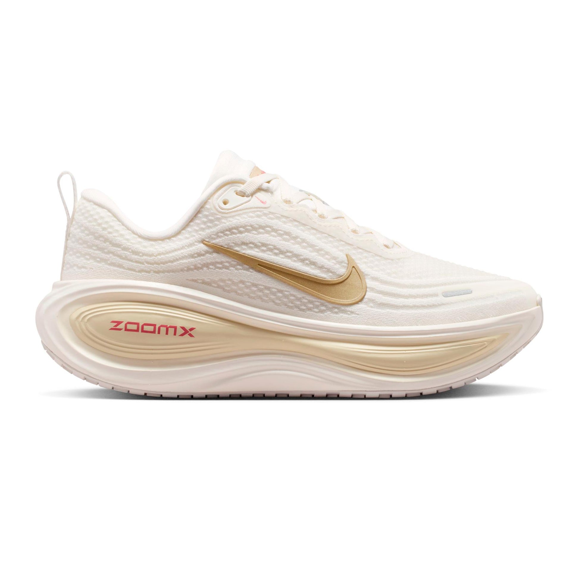 Nike Vomero Plus Neutrale schoen Dames - crème, goud